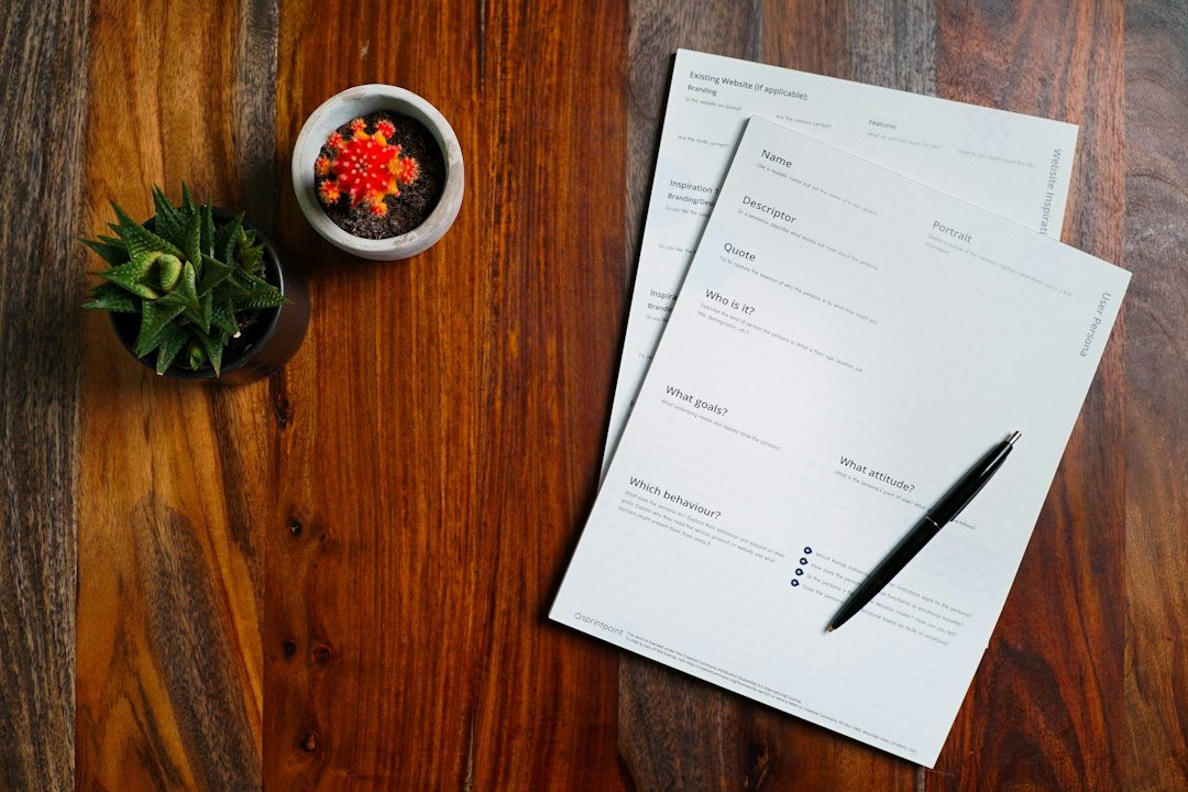Printed document pages on a desk illustrating page numbering in a PDF