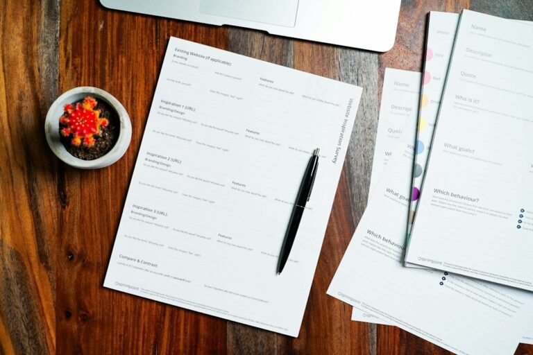 Two document versions on a desk for comparing PDF changes