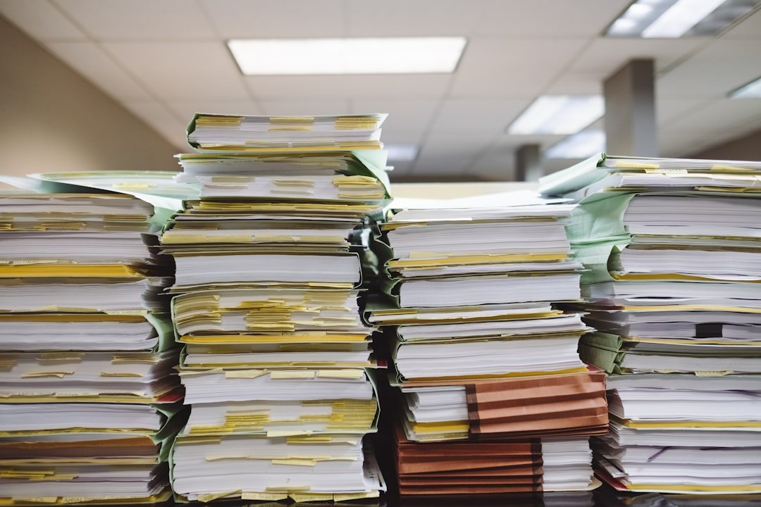 Stacks of office documents for a guide about adding watermarks to PDF files