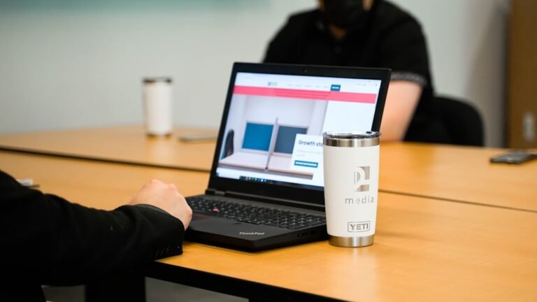 Laptop used to review tracked changes and comments before exporting a clean PDF