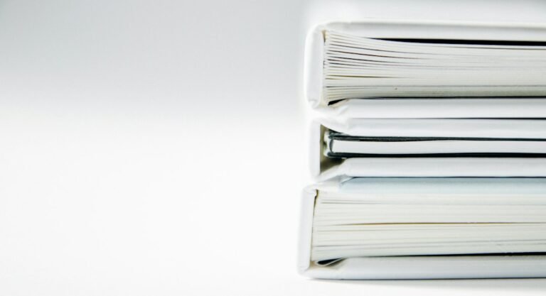 Stack of document folders representing a merged PDF that became too large