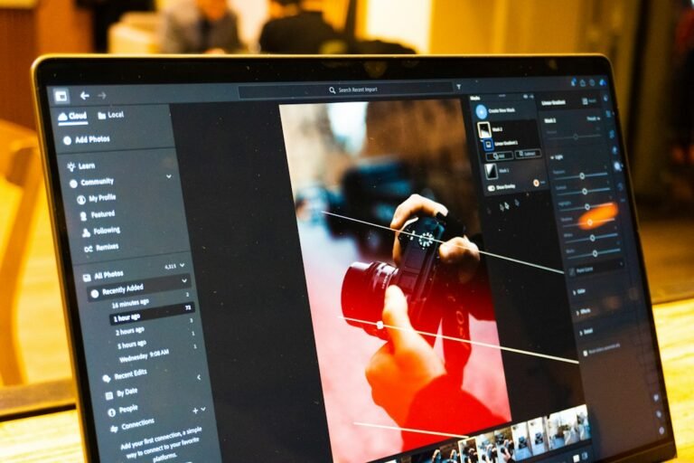 Photo-editing software displayed on a laptop for adjusting picture orientation
